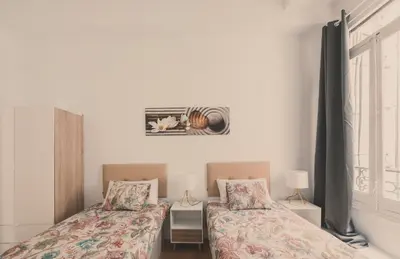 Cama o camas de una habitación en 8 rooms, 6 bathrooms over Gran Via Street