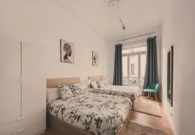 Cama o camas de una habitación en 8 rooms, 6 bathrooms over Gran Via Street