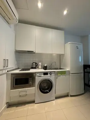 Una cocina o zona de cocina en estudio en centro madrid