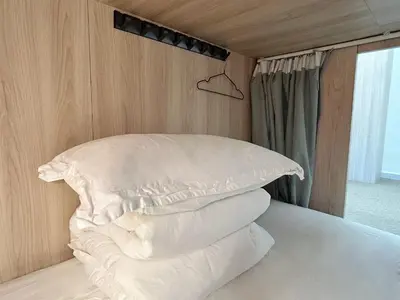 Cama o camas de una habitación en UNPLAN Hostel