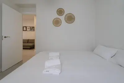 Cama o camas de una habitación en GuestReady - Embajadores Apartments