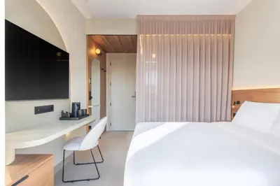 Cama o camas de una habitación en FORTINN Puerta del Sol