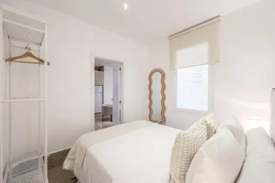 Cama o camas de una habitación en Apartamentos Embajadores II