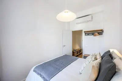 Cama o camas de una habitación en Apartamentos Embajadores II