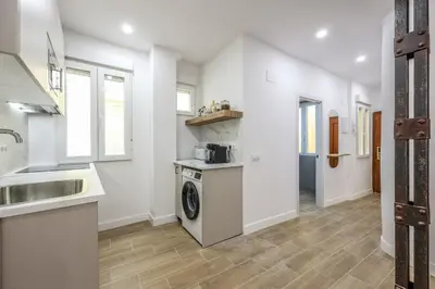 Una cocina o zona de cocina en Apartamentos Embajadores II