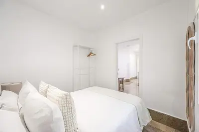 Cama o camas de una habitación en Apartamentos Embajadores II