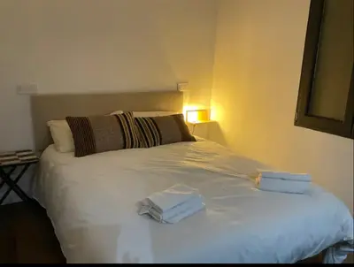Cama o camas de una habitación en Precioso loft de lujo