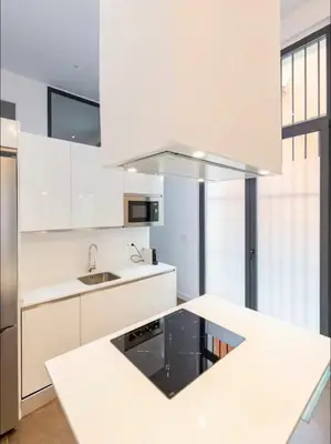 Una cocina o zona de cocina en Precioso loft de lujo