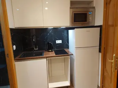 Una cocina o zona de cocina en El sol de Madrid n1