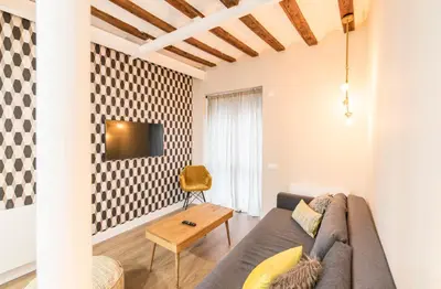 Zona de estar de Cómodo y precioso apartamento