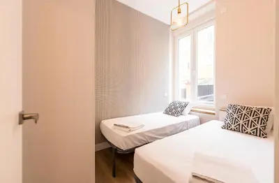 Cama o camas de una habitación en Loft chic luminoso