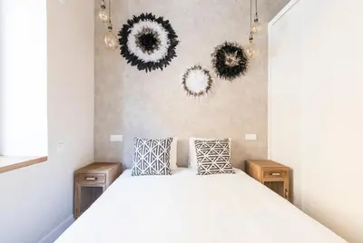 Cama o camas de una habitación en Loft chic luminoso