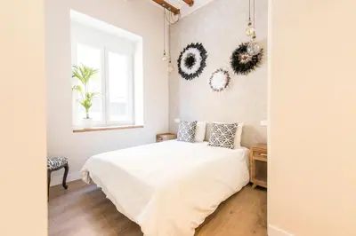 Cama o camas de una habitación en Loft chic luminoso