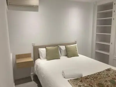 Cama o camas de una habitación en Apartamento silencioso en el centro de Madrid