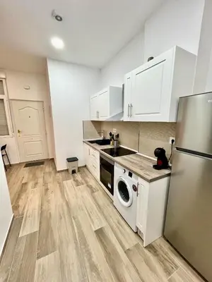 Una cocina o zona de cocina en precioso apartamento para 4 personas