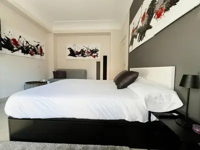 Cama o camas de una habitación en Habitación Oasis A centro de Madrid