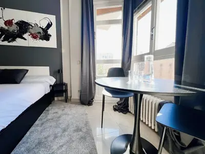 Cama o camas de una habitación en Habitación Oasis A centro de Madrid