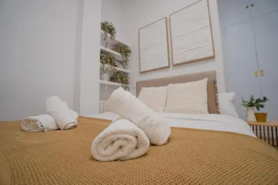 Cama o camas de una habitación en El Castizo Madrid centro by Hogar4