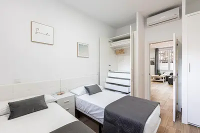 Cama o camas de una habitación en Apartamento a 5 minutos del centro de Madrid 6P