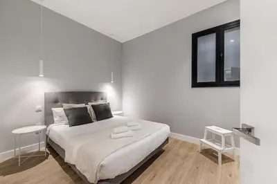 Cama o camas de una habitación en Waou Essence III Tirso de Molina - Corta Duración