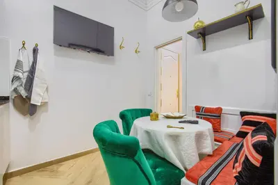 Una televisión o centro de entretenimiento en Salamanca Luxury Rooms