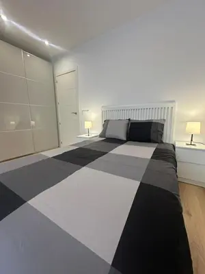 Cama o camas de una habitación en Homely Madrid River