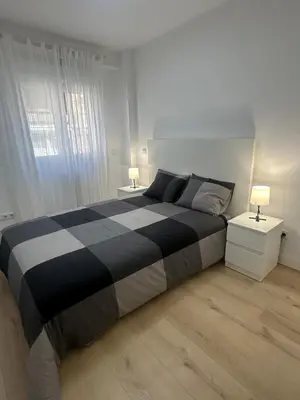 Cama o camas de una habitación en Homely Madrid River