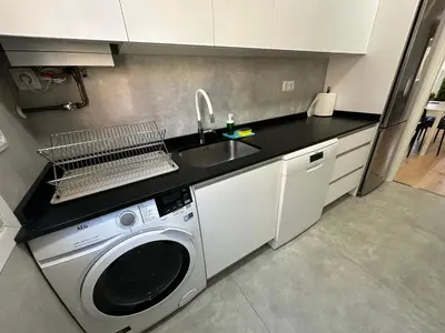 Una cocina o zona de cocina en Homely Madrid River