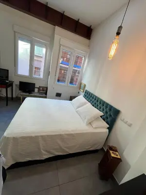 Cama o camas de una habitación en Vallehermoso Loft in downtown Madrid Aguelles