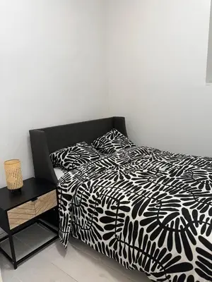 Cama o camas de una habitación en Estupendo piso en el corazón de Madrid