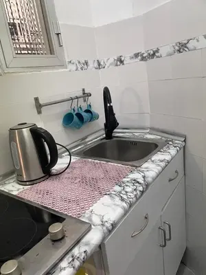 Una cocina o zona de cocina en Estupendo piso en el corazón de Madrid