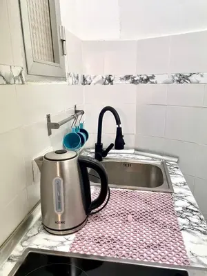 Una cocina o zona de cocina en Estupendo piso en el corazón de Madrid