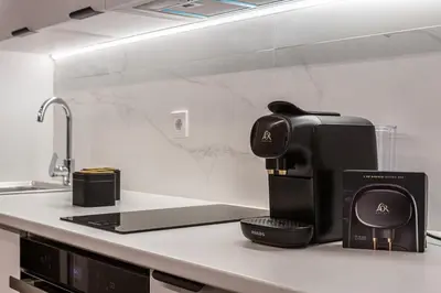 Una cocina o zona de cocina en Waou Essence IV Antón Martín - Corta Duración