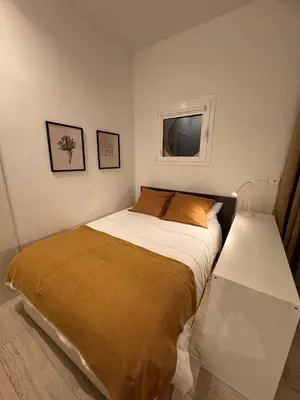 Cama o camas de una habitación en Apartamento cerca del Movistar-Arena Wizink