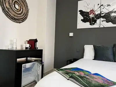 Cama o camas de una habitación en Habitación Oasis B centro de Madrid
