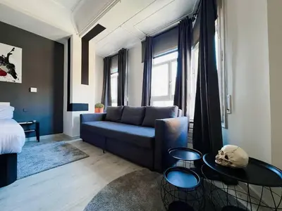 Zona de estar de Habitación Oasis B centro de Madrid