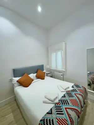 Cama o camas de una habitación en AR Movistar Arena-Wizink céntrico y moderno 2habitaciones