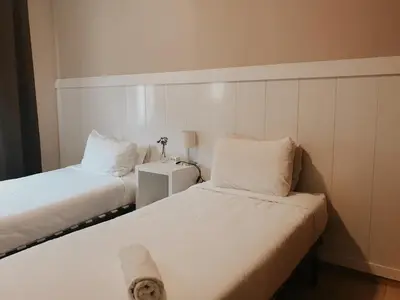 Cama o camas de una habitación en Metropolitan Atocha