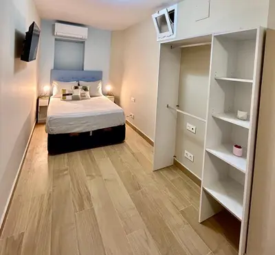Cama o camas de una habitación en Apartamento Centro Madrid Atocha