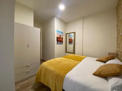Cama o camas de una habitación en El Jardín de Fornillos