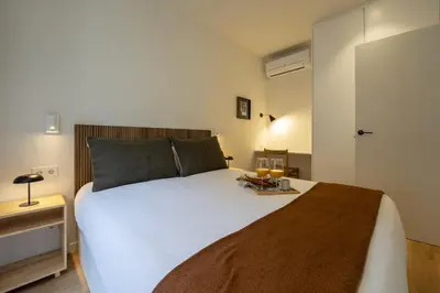 Cama o camas de una habitación en Reina Sofia Suite III