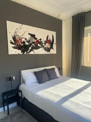 Cama o camas de una habitación en Habitación Oasis D centro de Madrid