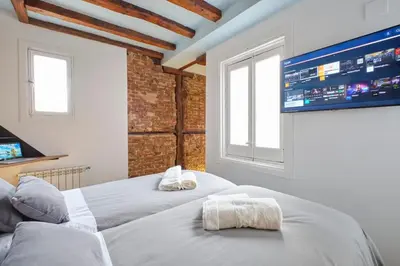 Cama o camas de una habitación en ººººPY Historical CityCentre WiFi AC SmartTVºººº
