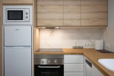 Una cocina o zona de cocina en Luxurious apartment in Malasaña Centro madrid Temporal VAL212
