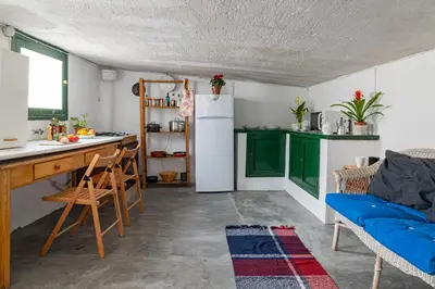 Una cocina o zona de cocina en Tejado de Antigua Fábrica Industrial en Acacias