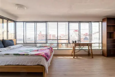 Cama o camas de una habitación en Tejado de Antigua Fábrica Industrial en Acacias