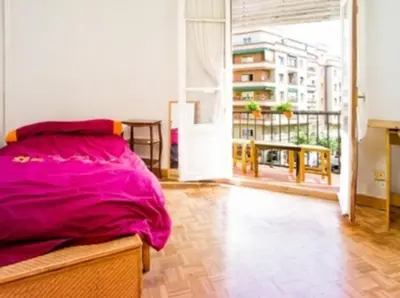 Cama o camas de una habitación en Habitación doble con Vistas a la Ciudad