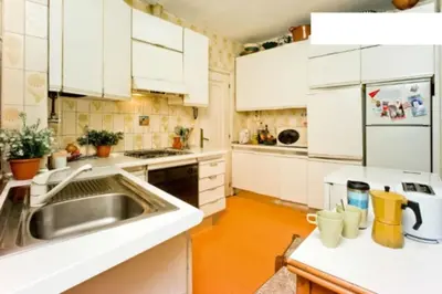 Una cocina o zona de cocina en Habitación doble con Vistas a la Ciudad