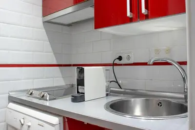 Una cocina o zona de cocina en Best Location Puerta de Alcalá