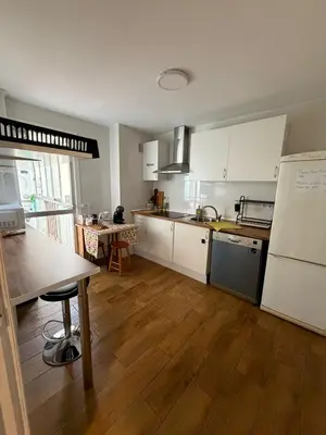 Una cocina o zona de cocina en Private Rooms Madrid Atocha